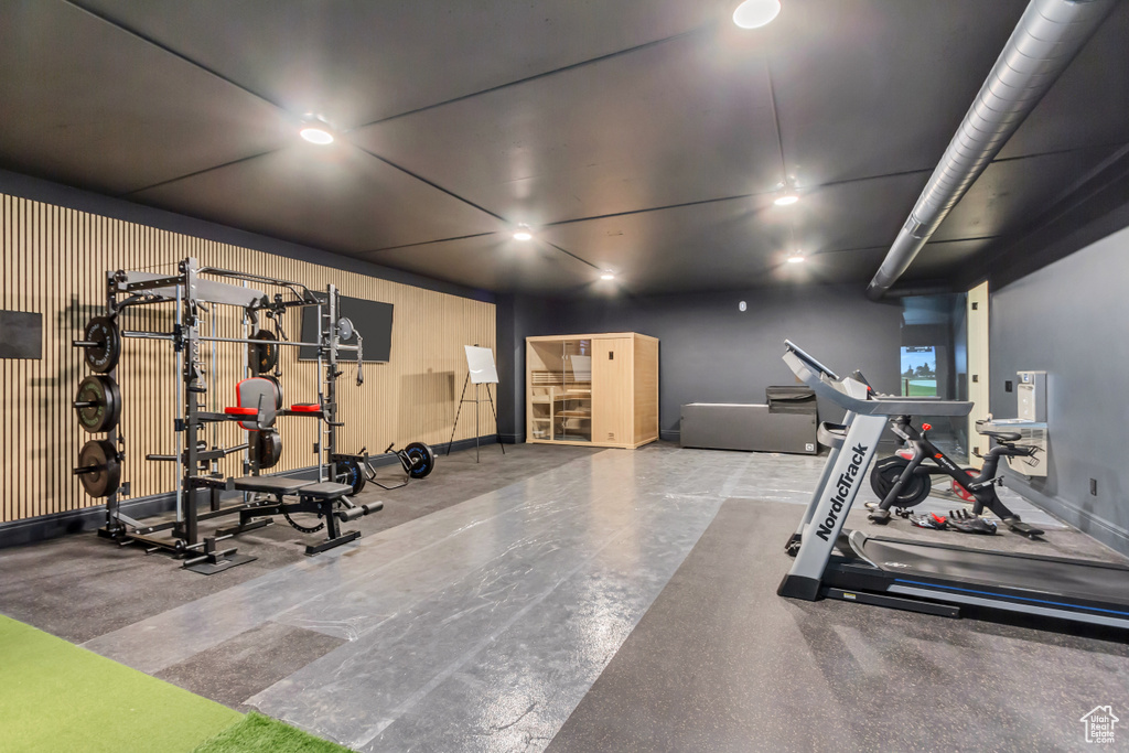 Exercise area featuring baseboards
