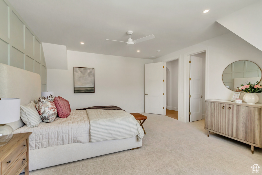 Bedroom featuring recessed lighting, light colored carpet, and a ceiling fan