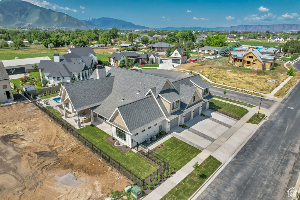 Aerial view of residential area with mountains