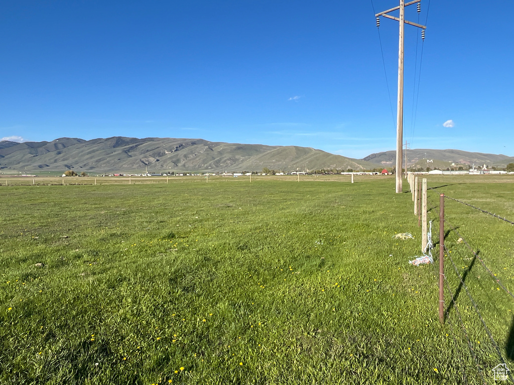 Mountain view featuring rural landscape and a pastoral area