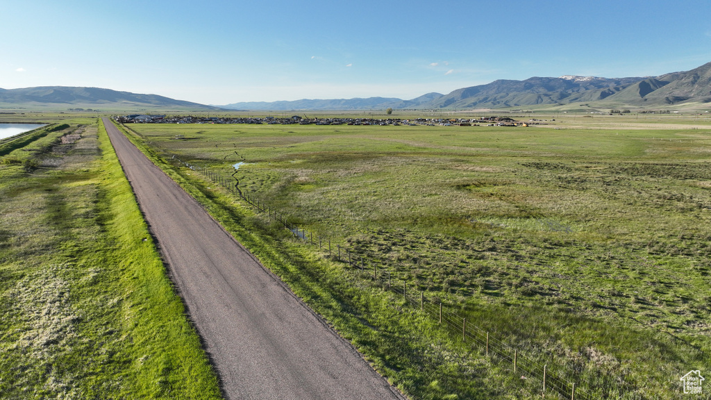 View of mountain background featuring rural landscape