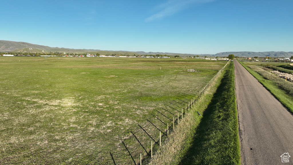 Aerial view of sparsely populated area with a mountainous background