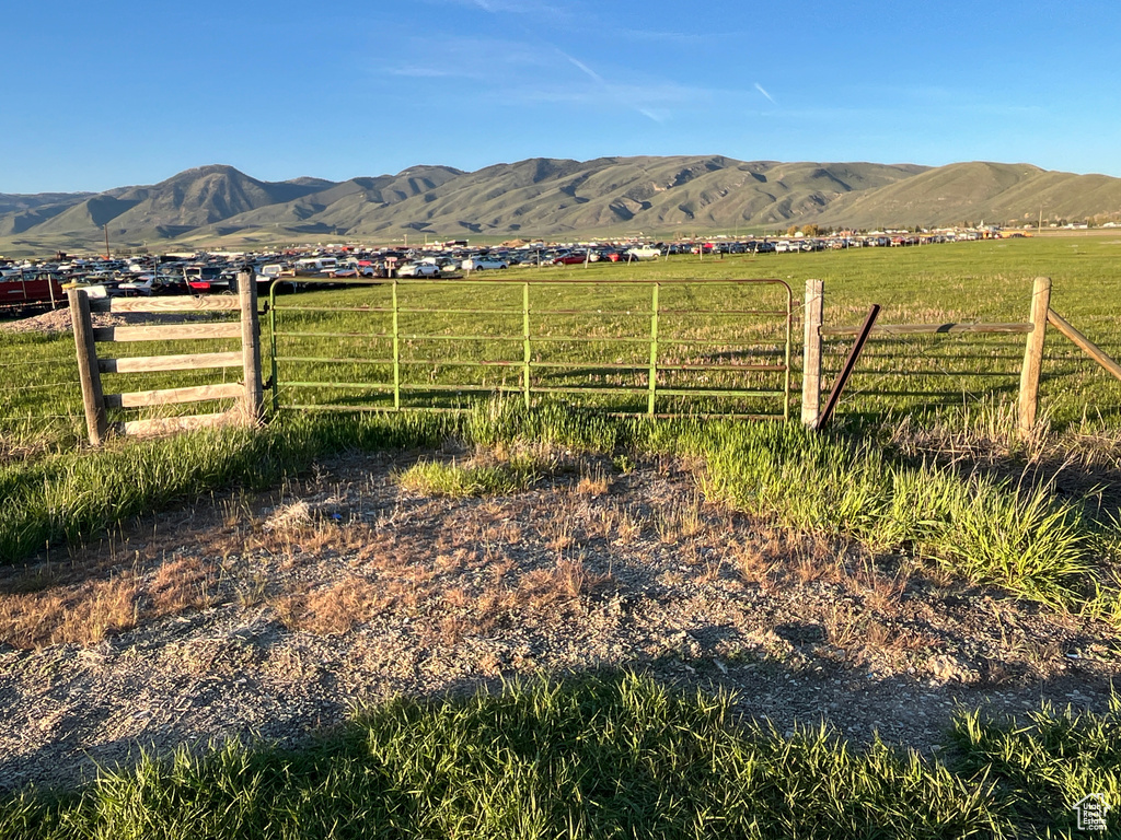 View of mountain background featuring rural landscape