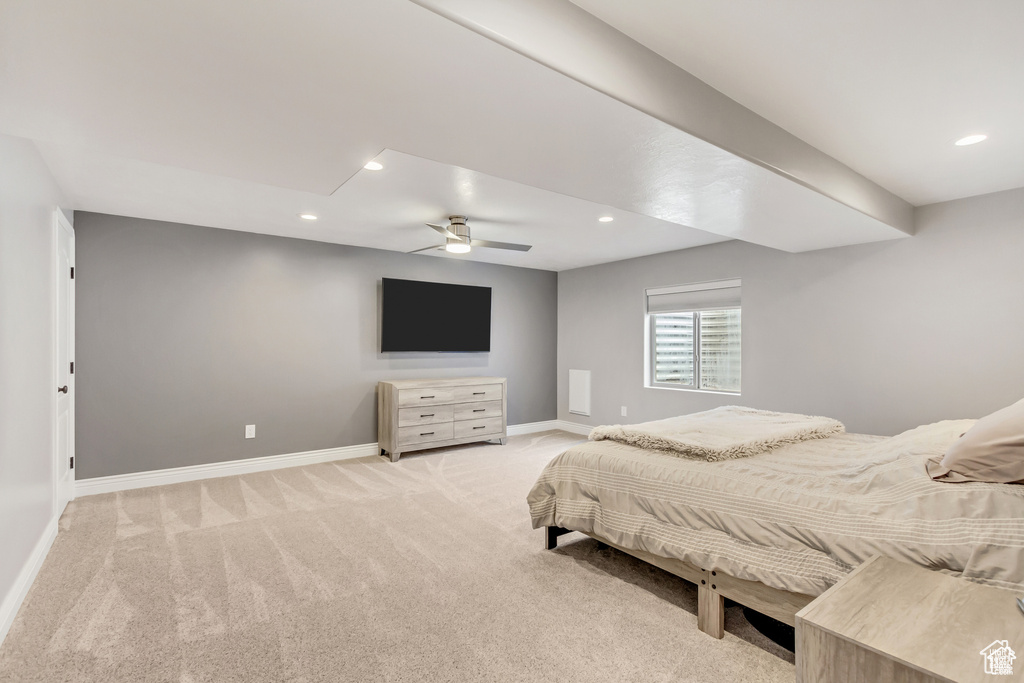 Bedroom with light colored carpet, baseboards, recessed lighting, and a ceiling fan
