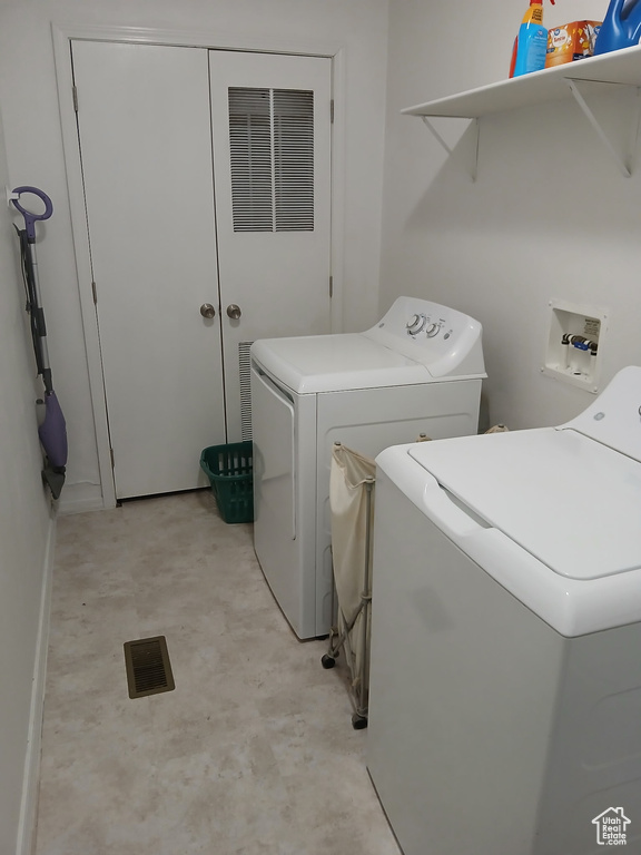 Laundry room with washer and dryer