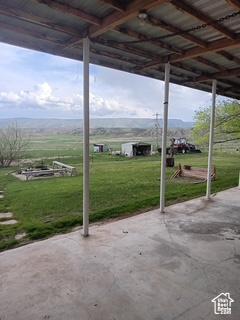 View of patio featuring a mountain view