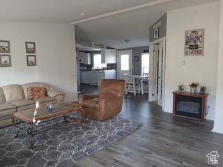 Living area with wood finished floors