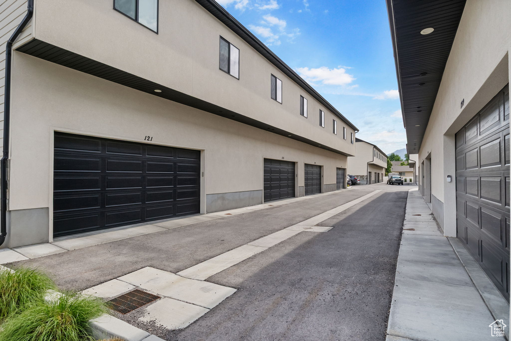 View of asphalt alley