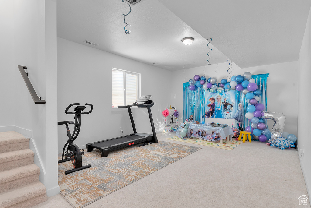 Exercise area with carpet flooring