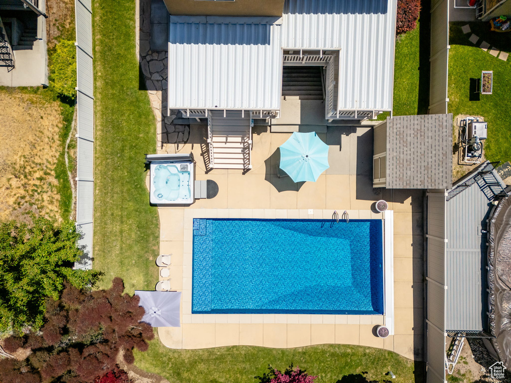 View from above of property featuring a pool
