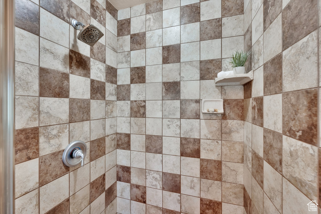 Bathroom with tiled shower