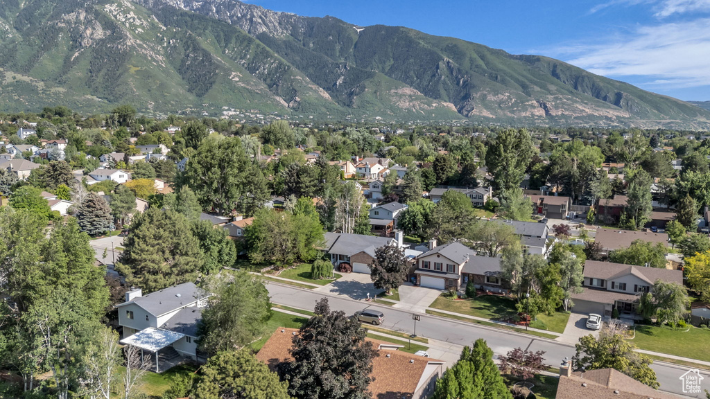 View of mountain background featuring nearby suburban area