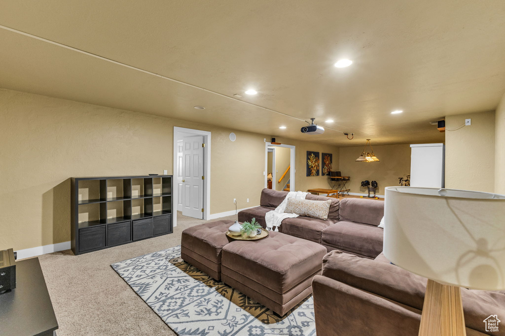 Living room featuring recessed lighting, carpet, and baseboards