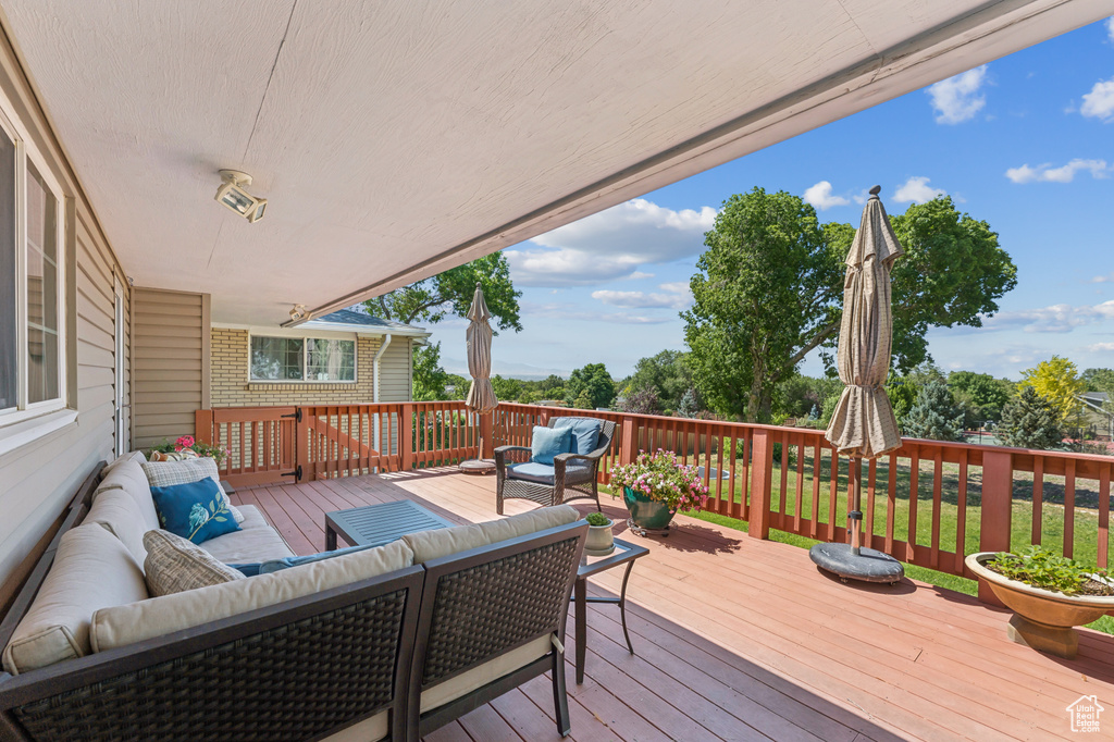 Wooden terrace with outdoor lounge area