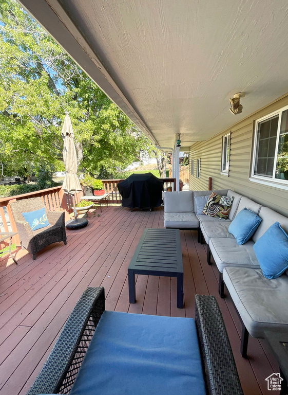 Wooden deck with an outdoor hangout area
