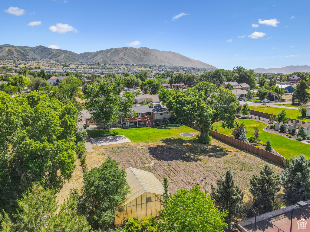 View of mountain background featuring nearby suburban area