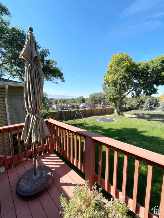 Wooden deck with a playground