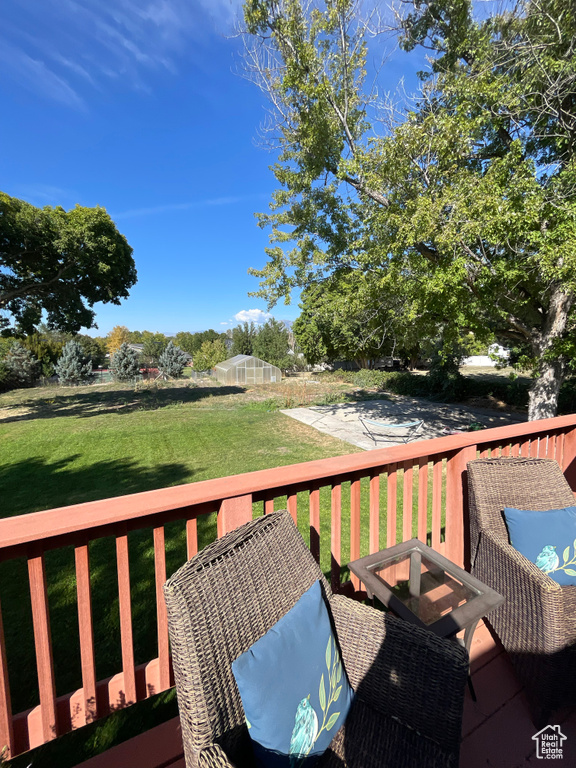 Wooden deck with a yard