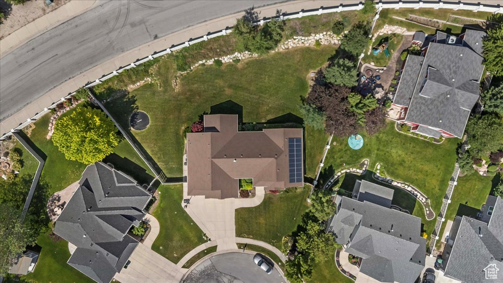 Aerial view of property's location with nearby suburban area
