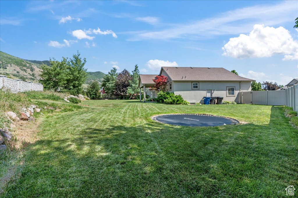View of yard with a mountain view