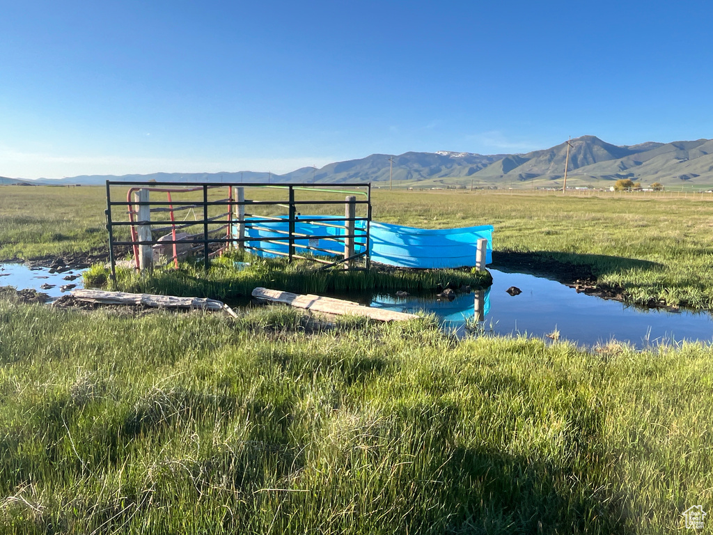 View of community with a mountain view and a view of rural / pastoral area