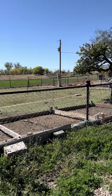 View of yard with a view of countryside