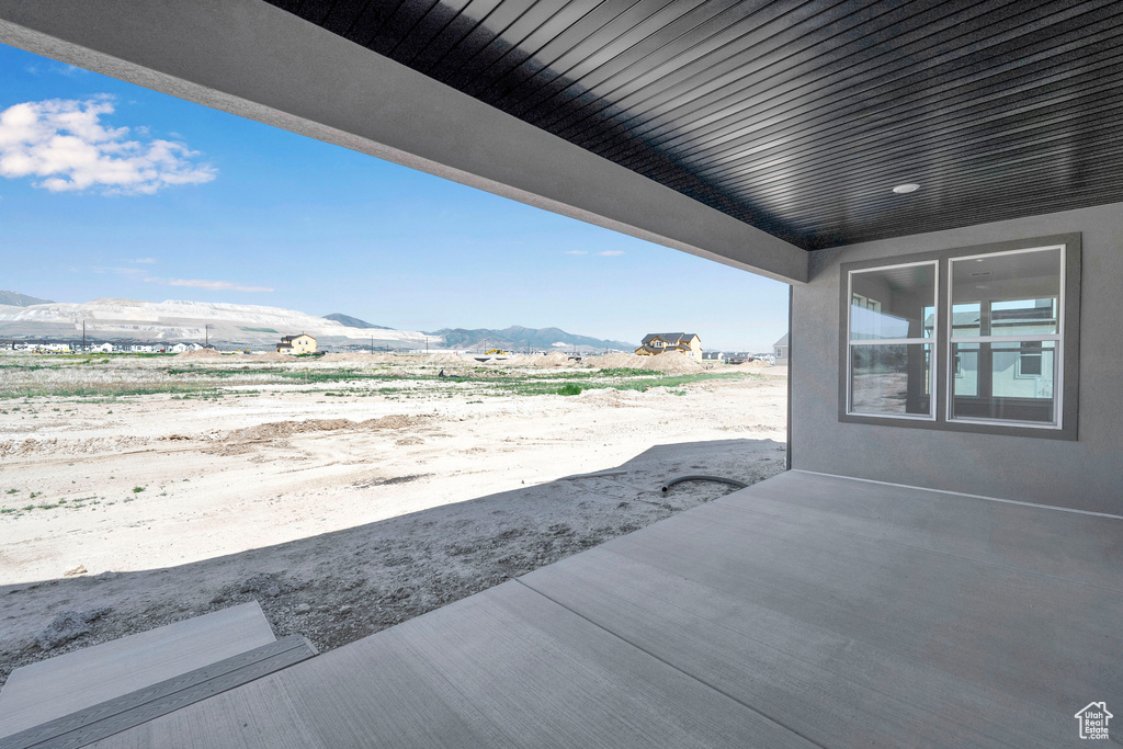View of patio / terrace featuring a mountain view