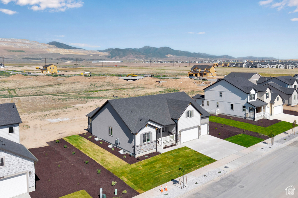 Aerial view of residential area with mountains