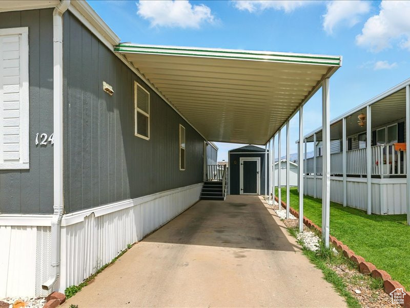 View of car parking with a carport