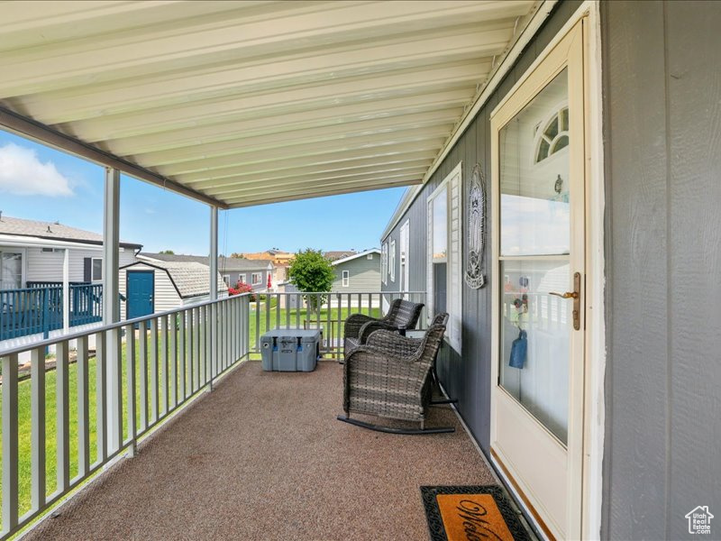 Balcony featuring a residential view