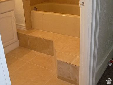 Bathroom view of a tub