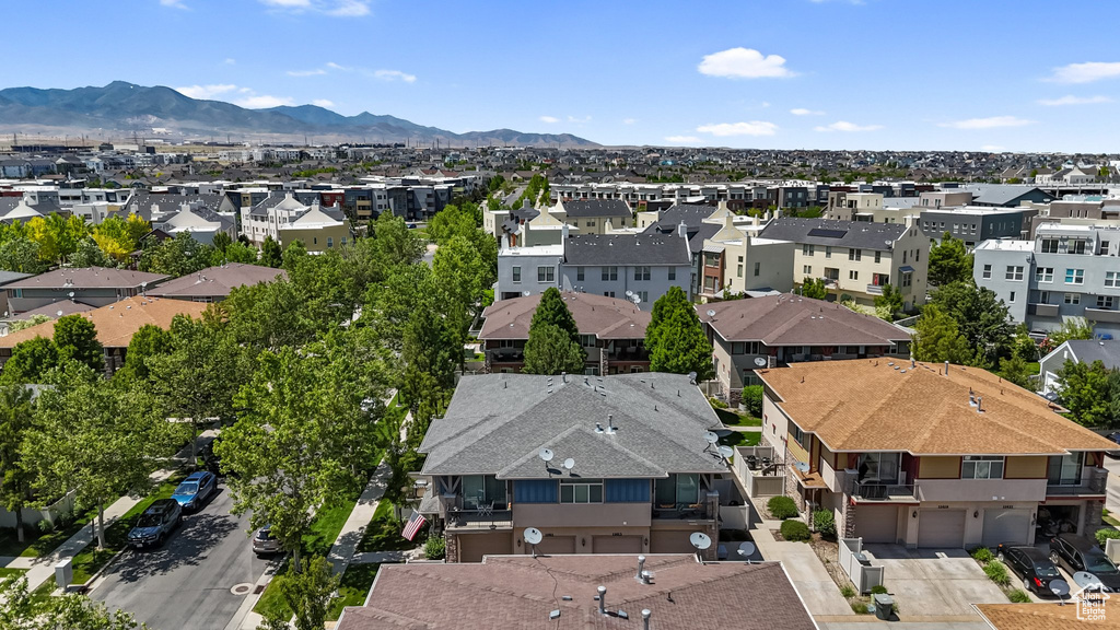 Aerial view of residential area featuring mountains