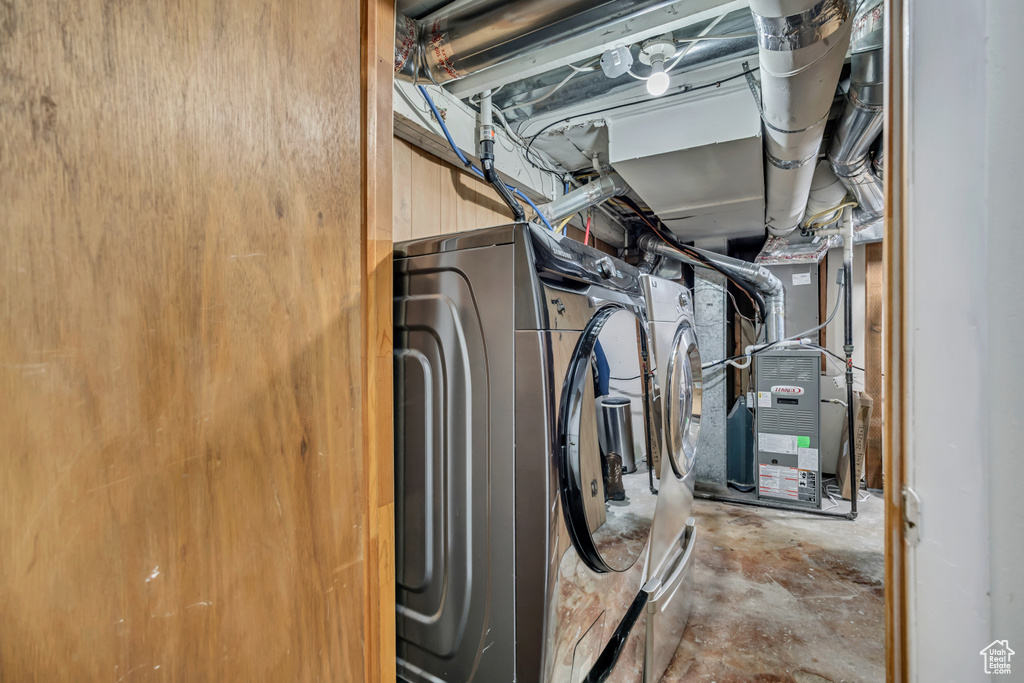 Washroom with washer / dryer and heating unit