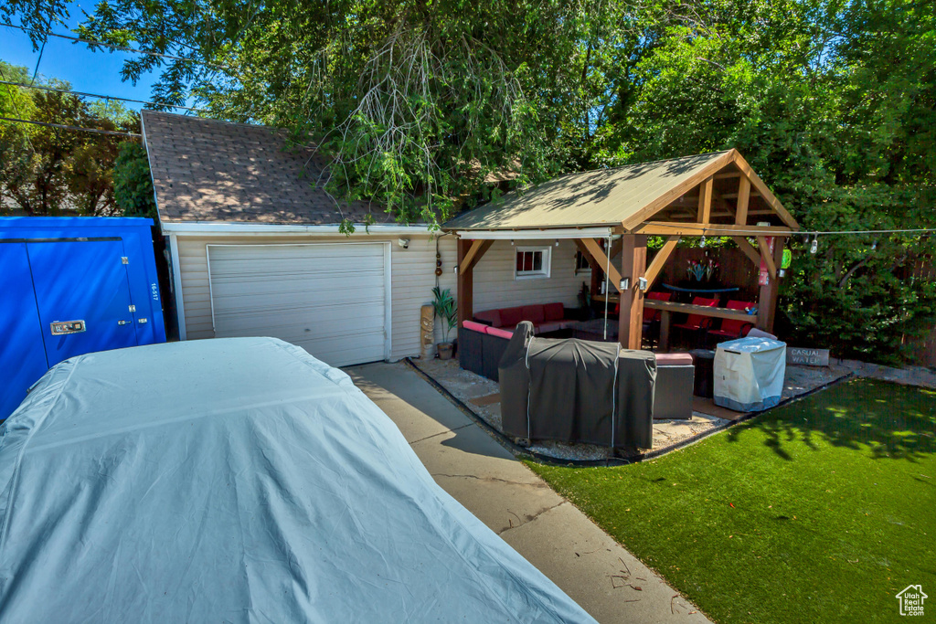 Garage featuring driveway