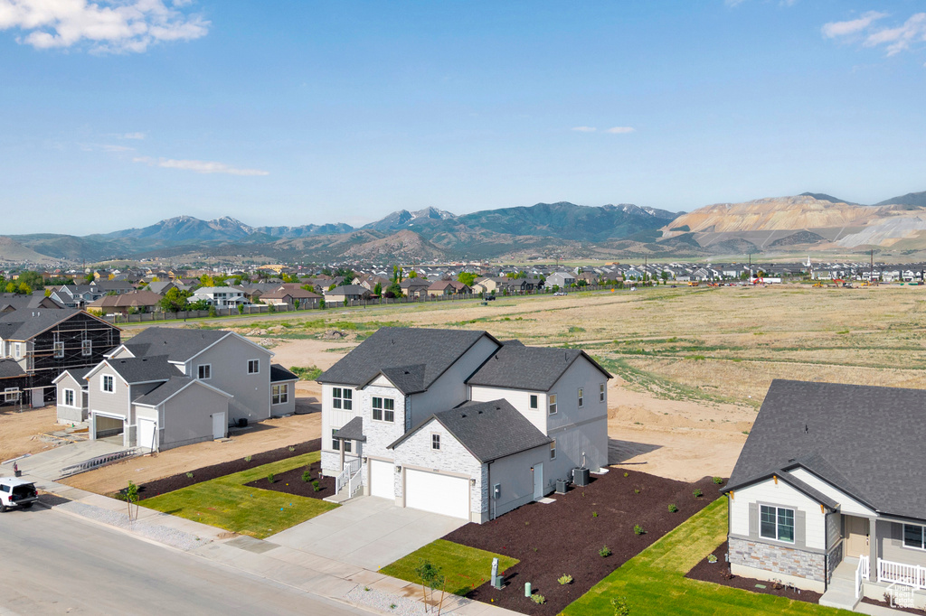 View of mountain backdrop with nearby suburban area