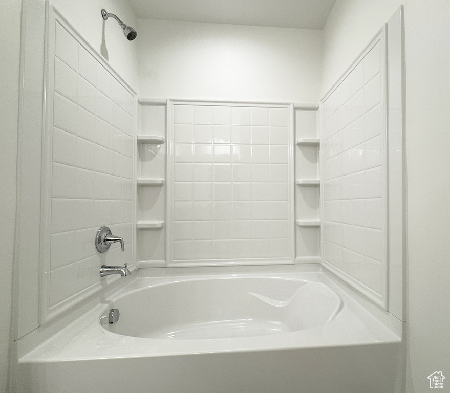 Bathroom featuring  shower combination