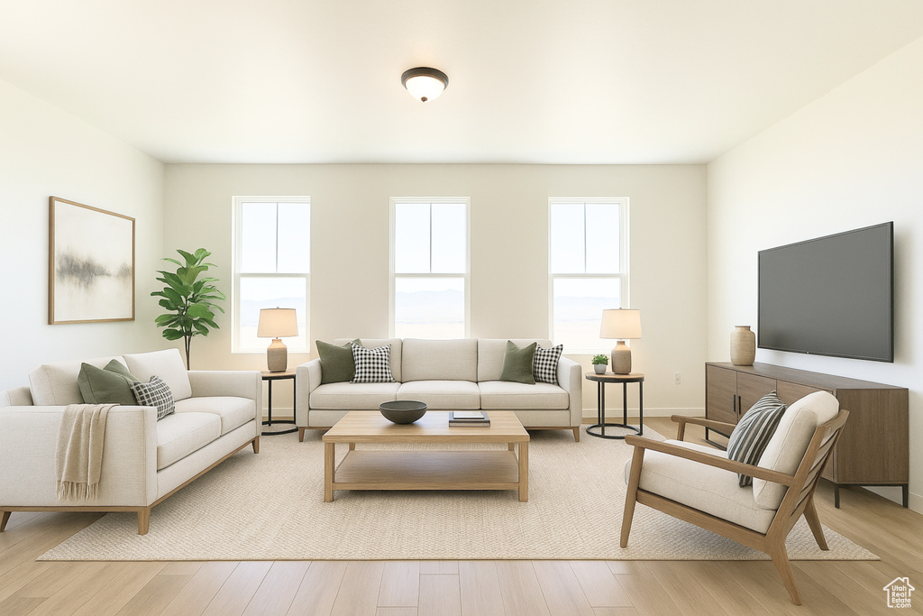 Living room featuring light wood-style floors