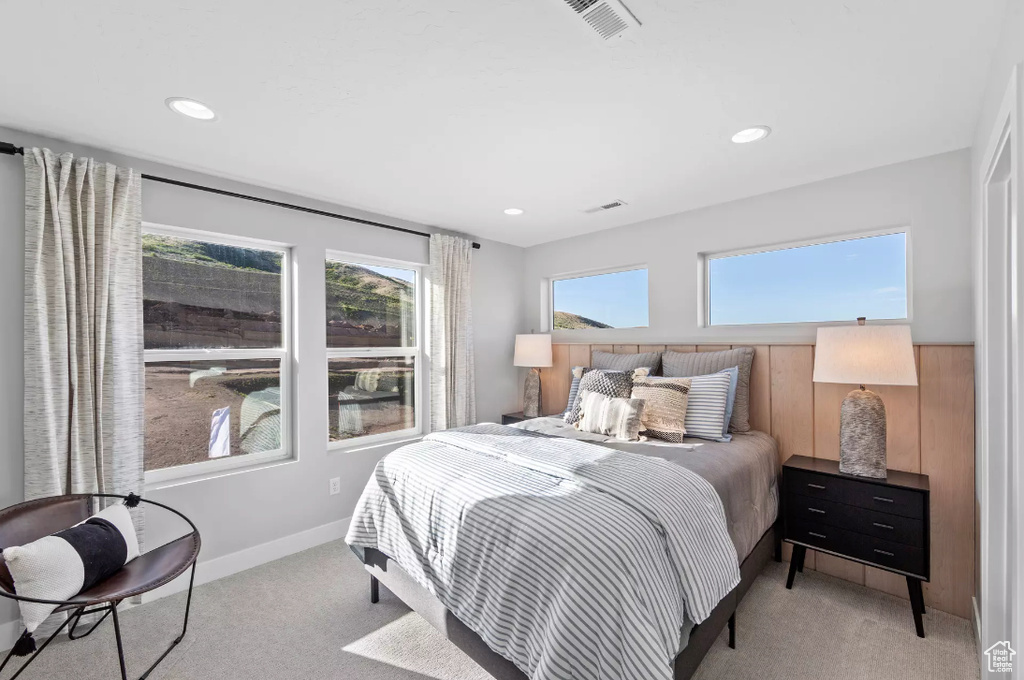 Bedroom with carpet floors, recessed lighting, and baseboards