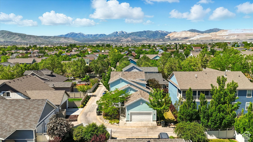 Aerial view of residential area with mountains