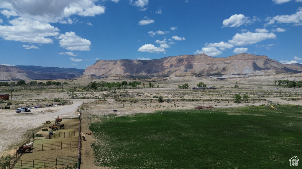 View of mountain backdrop featuring rural landscape