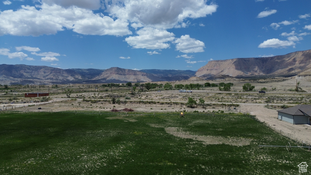View of mountain backdrop featuring rural landscape