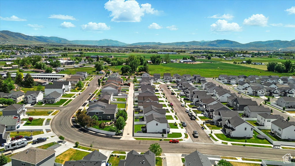 Aerial view of residential area with a mountain backdrop