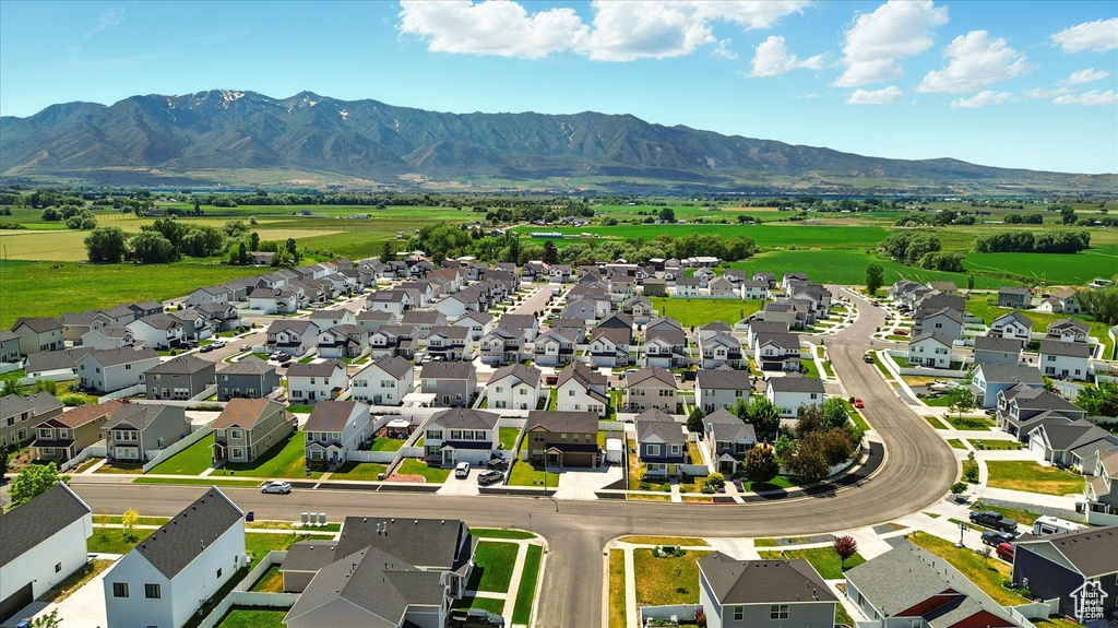 Aerial view of residential area with a mountainous background