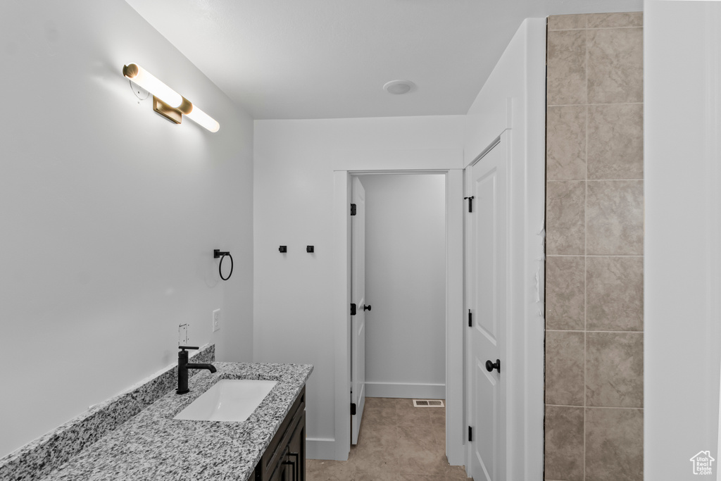 Full bath with vanity