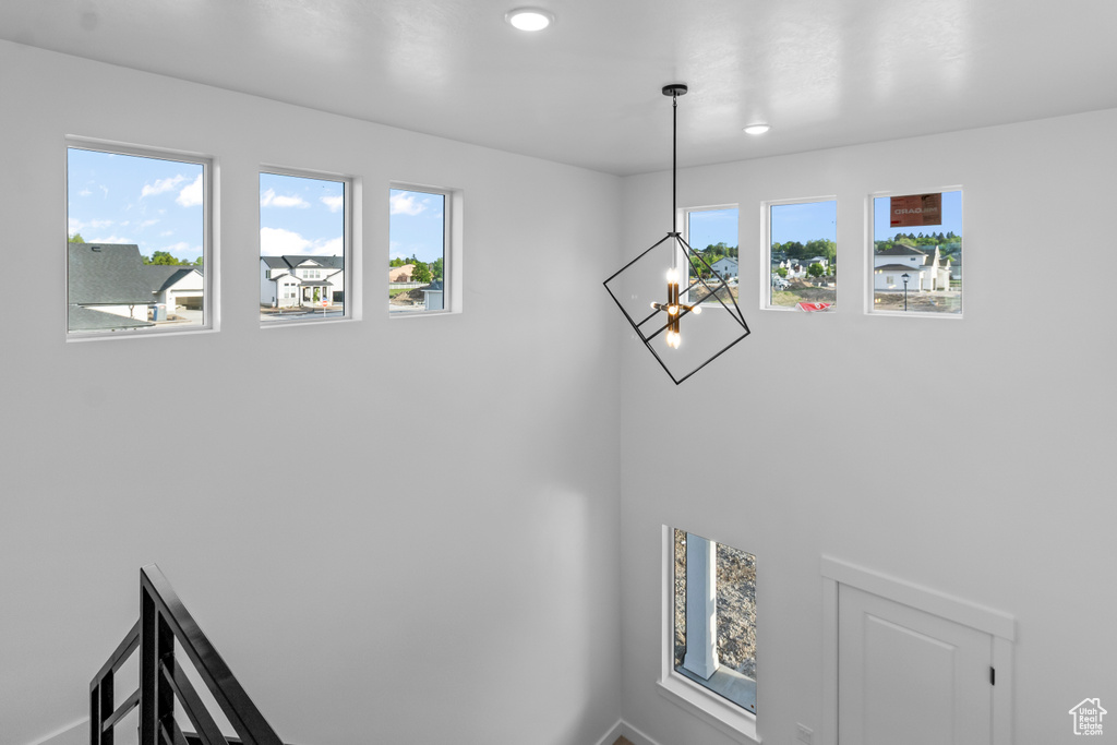 Detailed view of a chandelier and recessed lighting