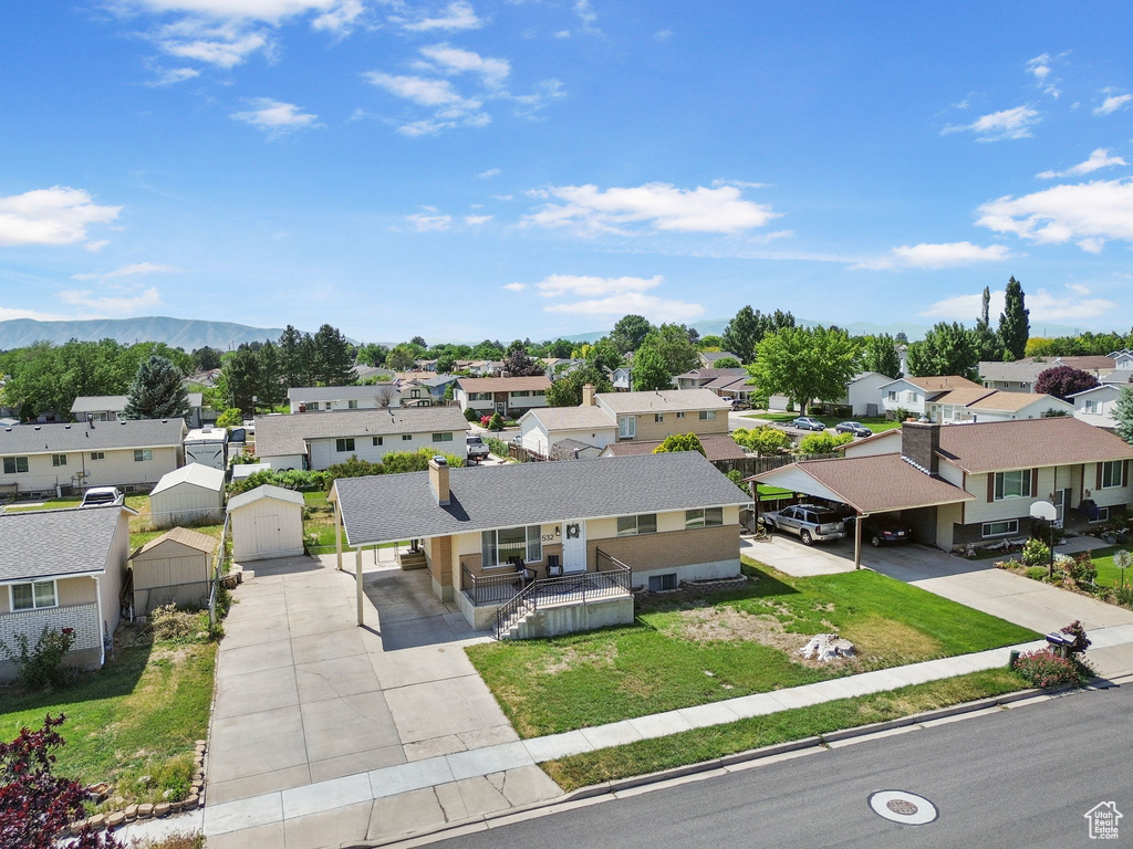 Aerial view of residential area with a mountain backdrop