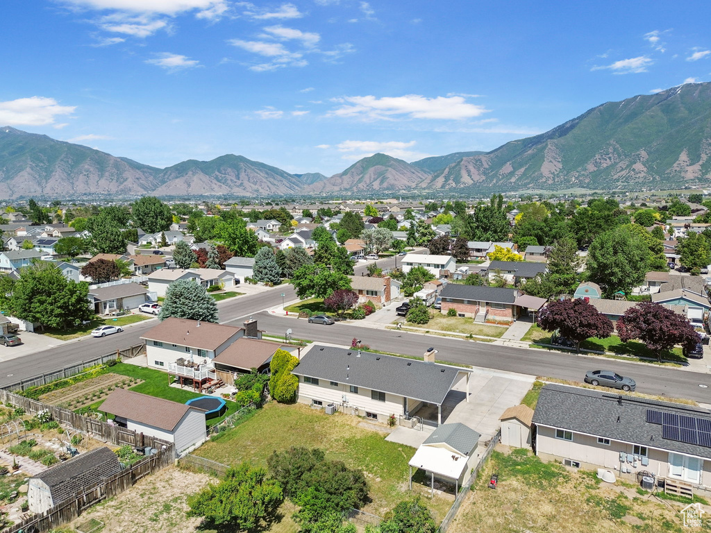 Aerial view of residential area with a mountainous background