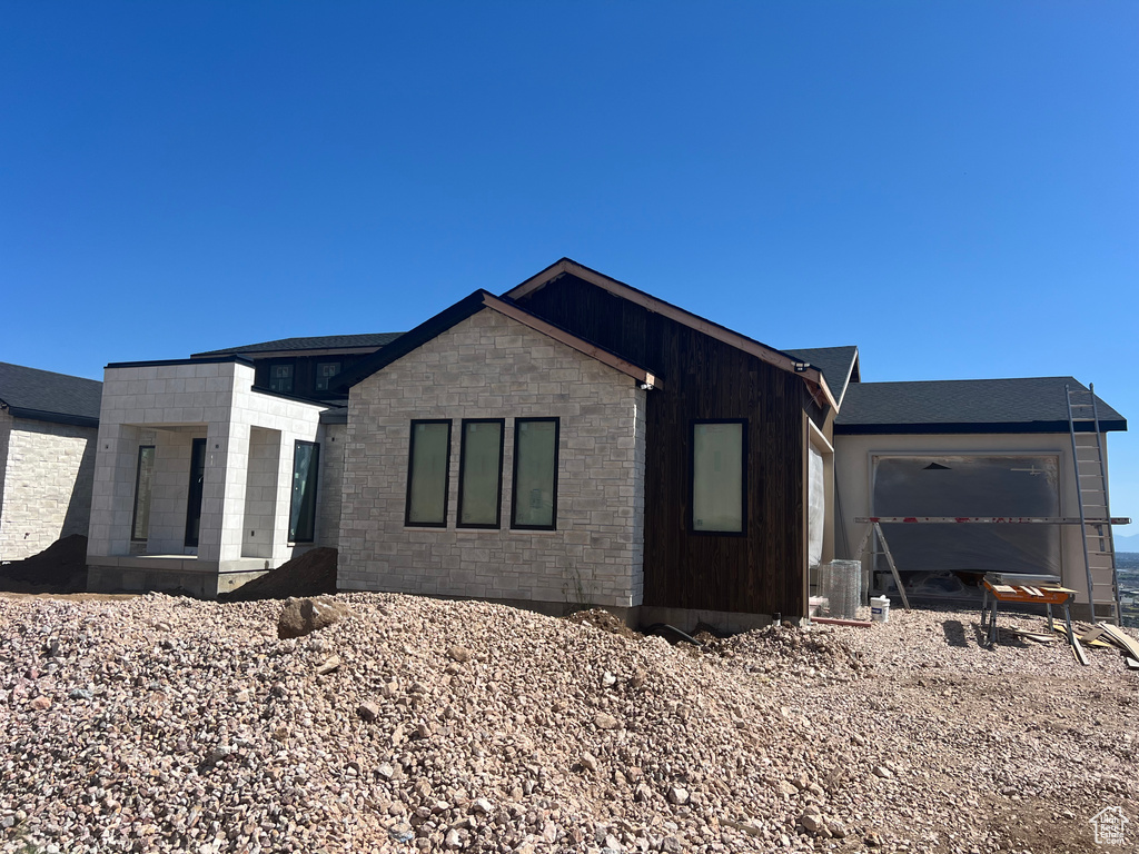 View of front of home with a garage