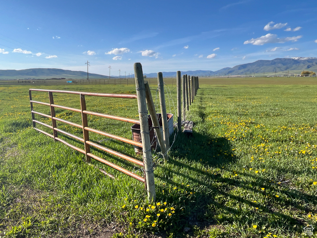 View of mountain background featuring rural landscape and agricultural land