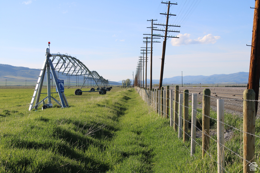 View of yard featuring a view of countryside and a mountain view